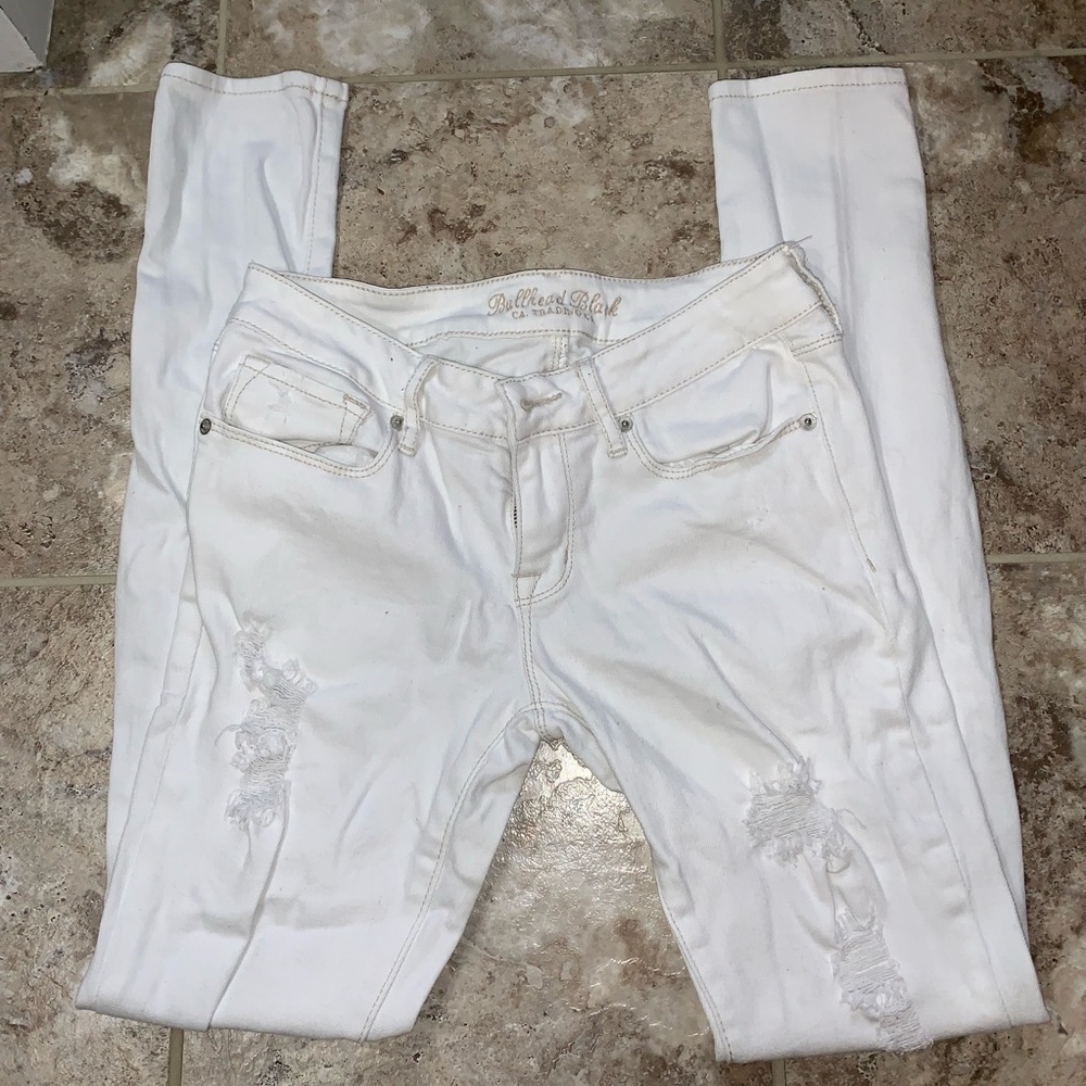 E- White low rise jeans (picture shown)